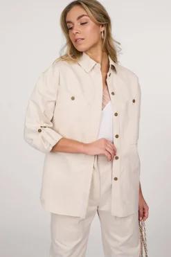 Dames blouse lange mouw bruin
