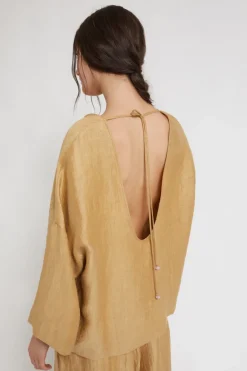 Dames blouse lange mouw goud